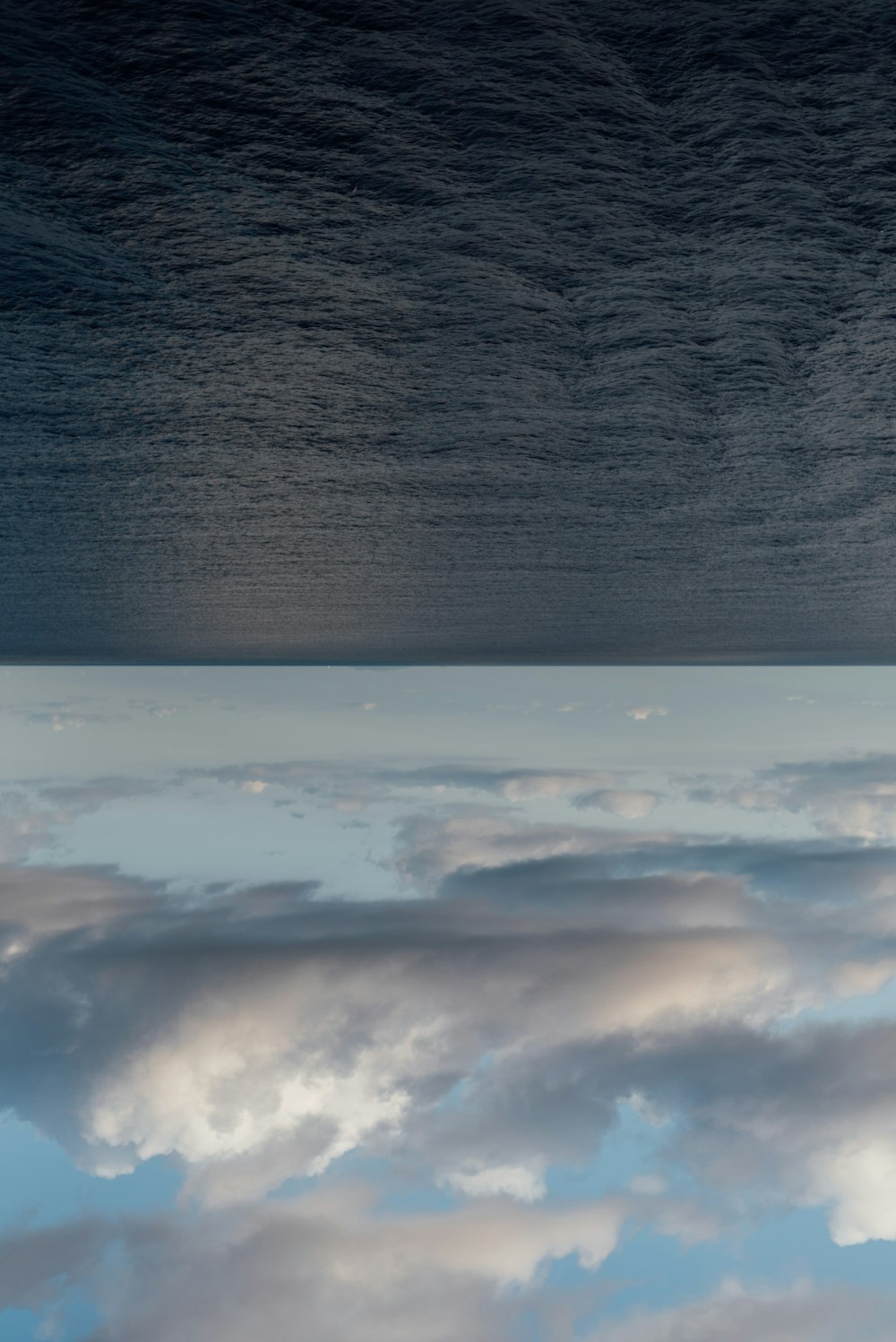 white clouds over body of water