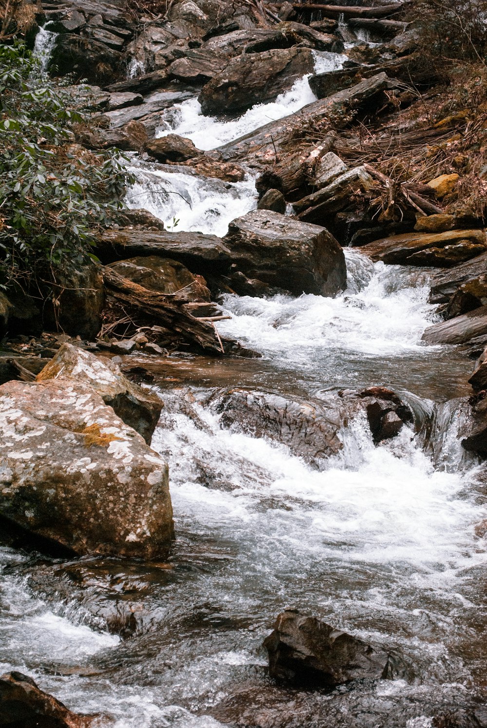 gray rocks on river during daytime