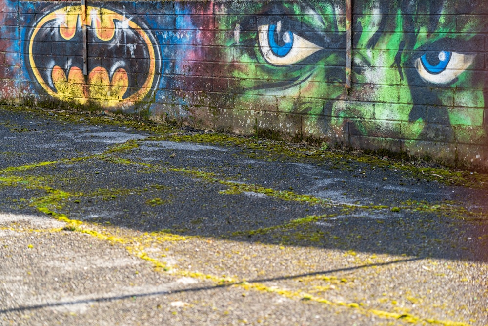 blue and white graffiti on wall