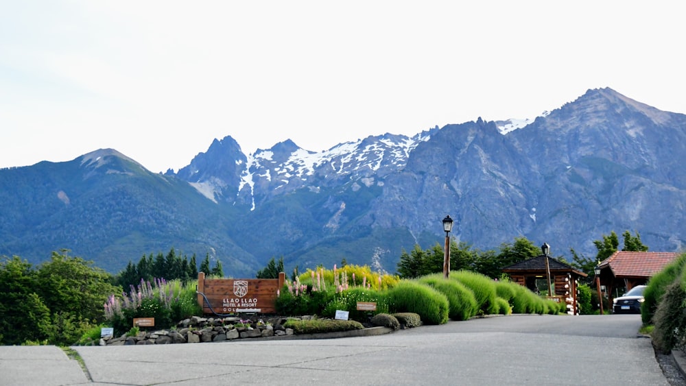 green grass field near mountain during daytime