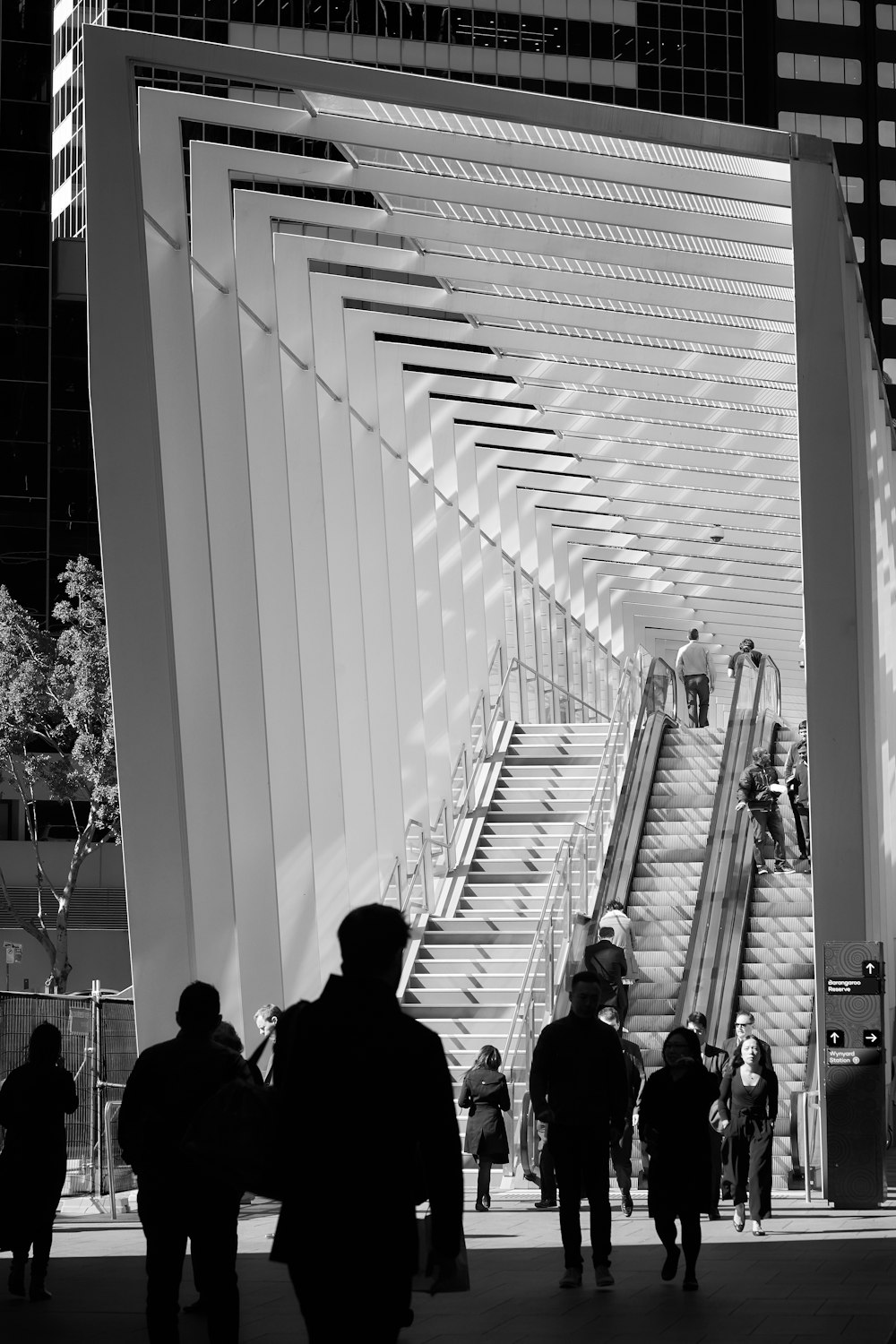 grayscale photo of people in a room