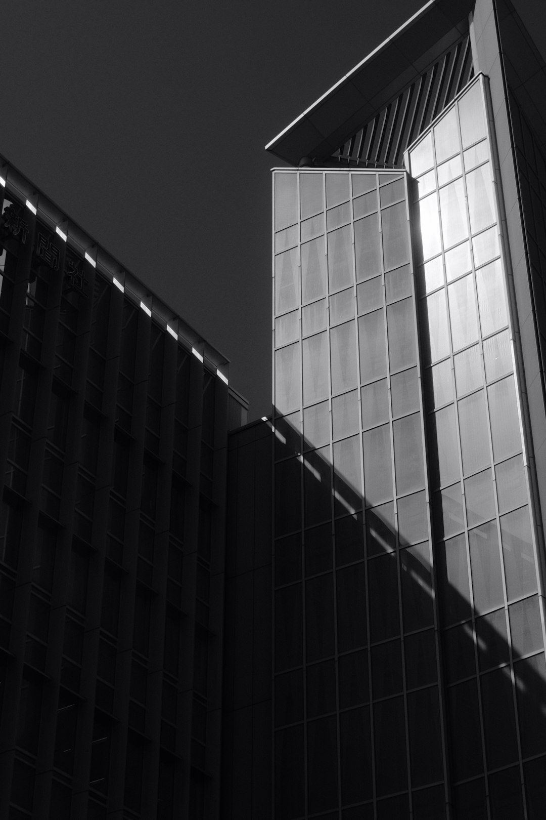 grayscale photo of high rise building