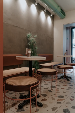 Cozy interior corner of cocó & co. with subtle lighting and branded elements in view.