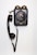 black and gray corded telephone