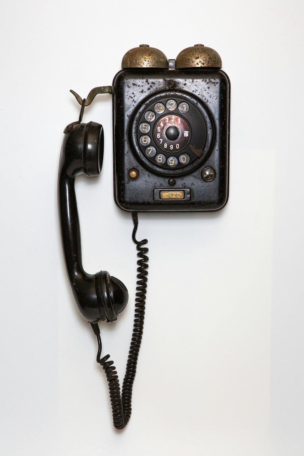 black and gray corded telephone