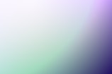 A gradient background with soft transitions between pastel colors, including shades of purple, green, and blue.