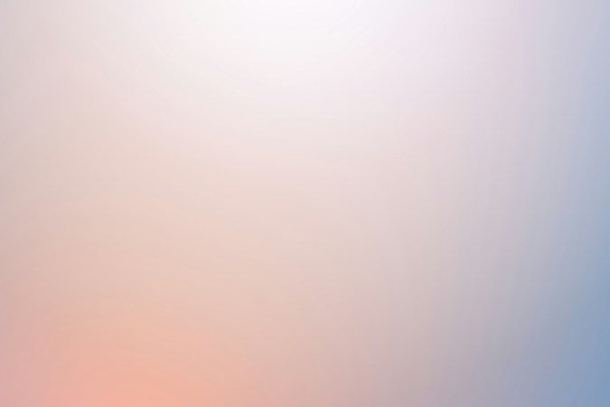 A gradient pattern with soft transitions between pastel colors, including shades of blue, pink, and orange, creating a soothing and minimalistic appearance.