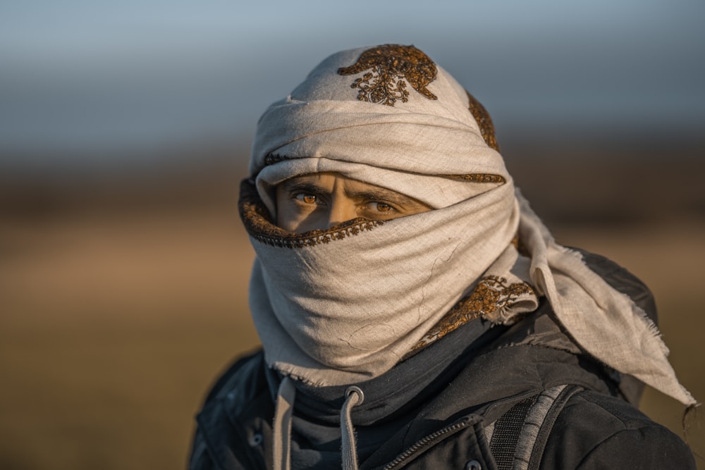 person in blue hoodie wearing white hijab