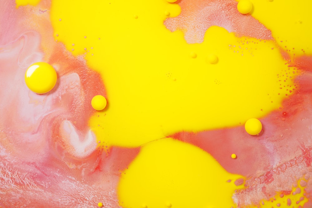 yellow and red liquid on clear plastic container