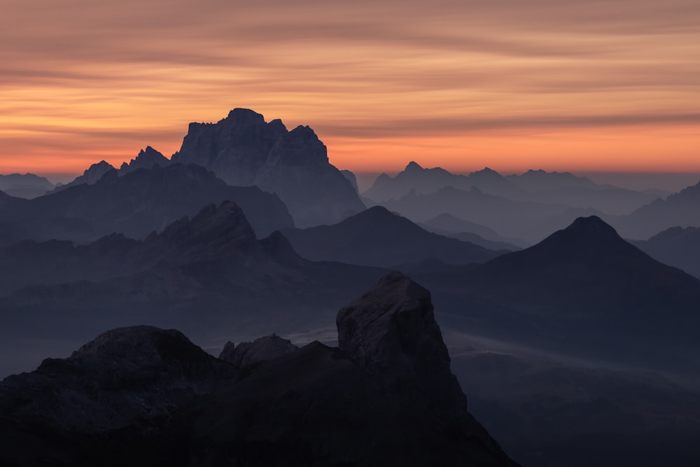 silhouette of mountains during sunset