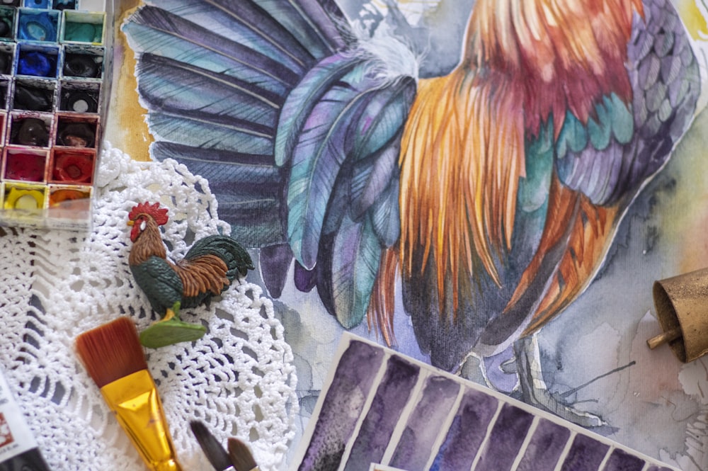 blue yellow and red rooster painting