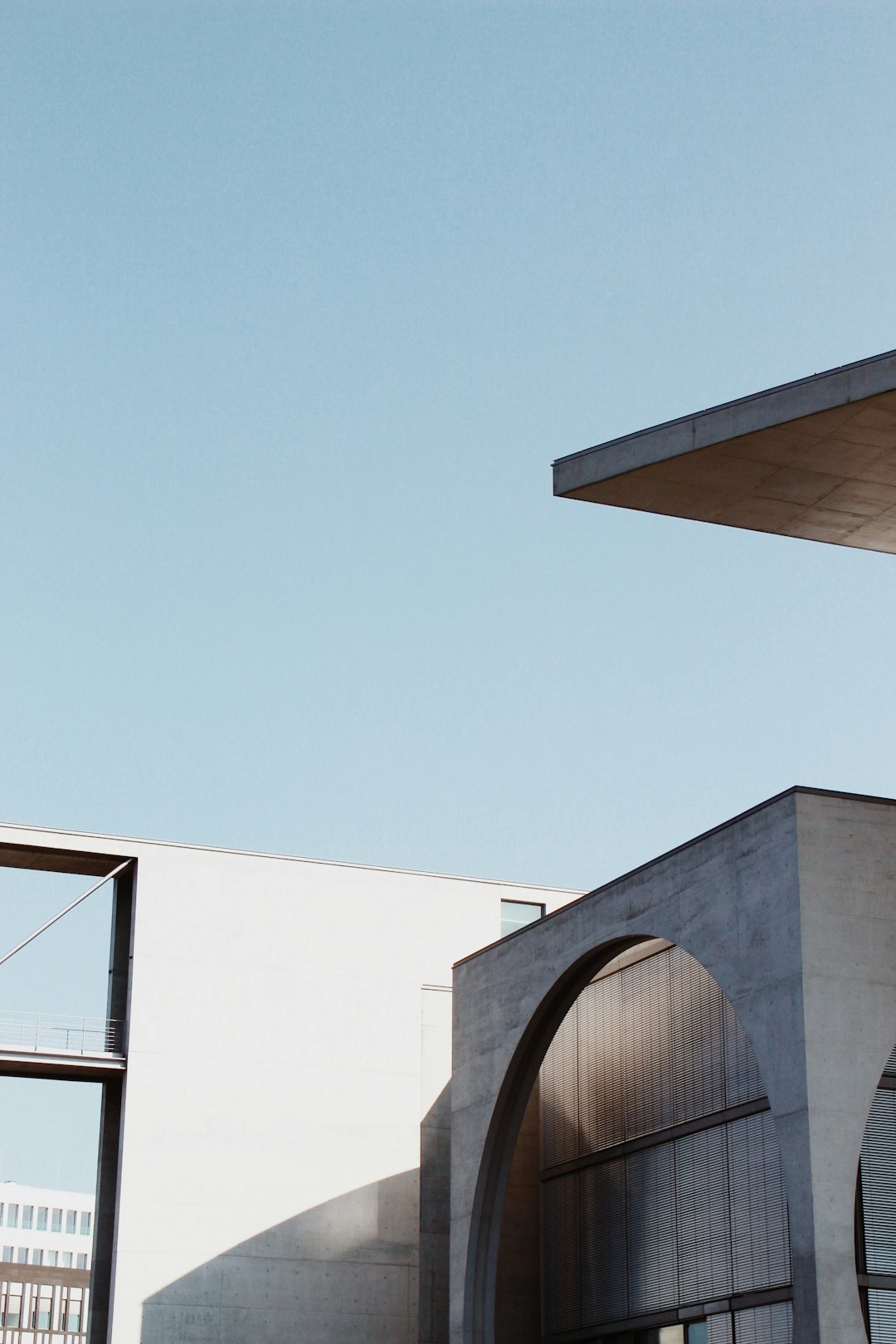 gray concrete building under blue sky during daytime