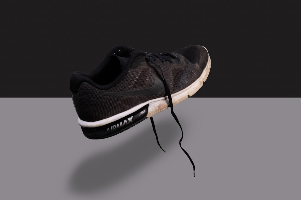 Black and white nike athletic shoe photo – Free Product photography Image  on Unsplash