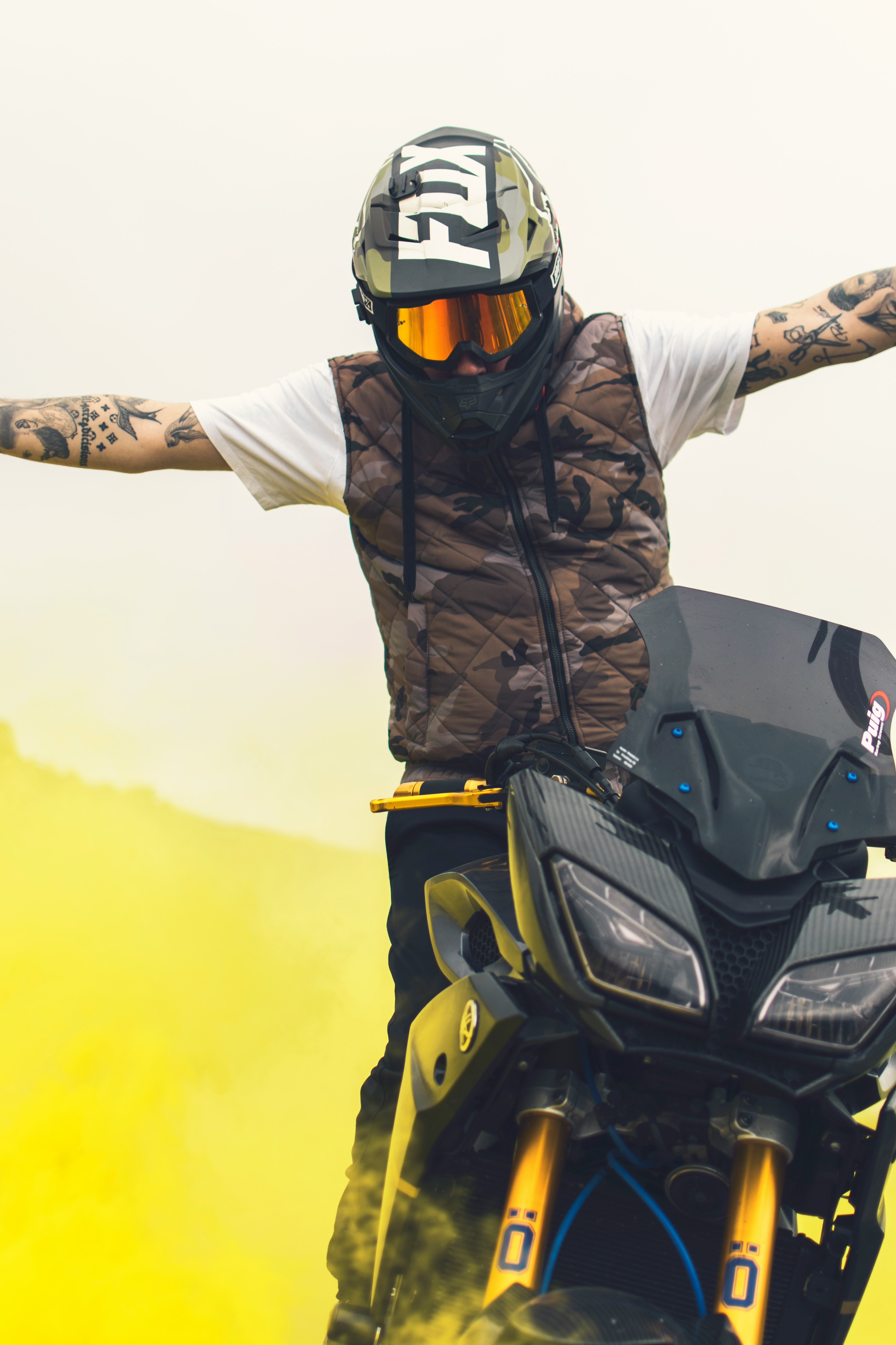 man in black helmet riding black motorcycle