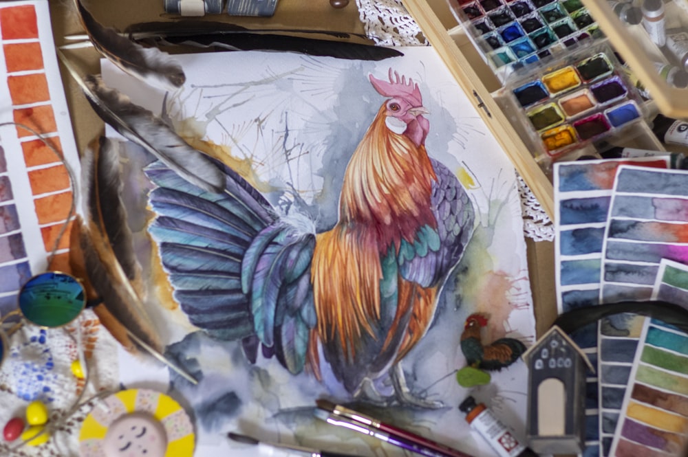 Pintura de gallo amarillo, rojo y azul