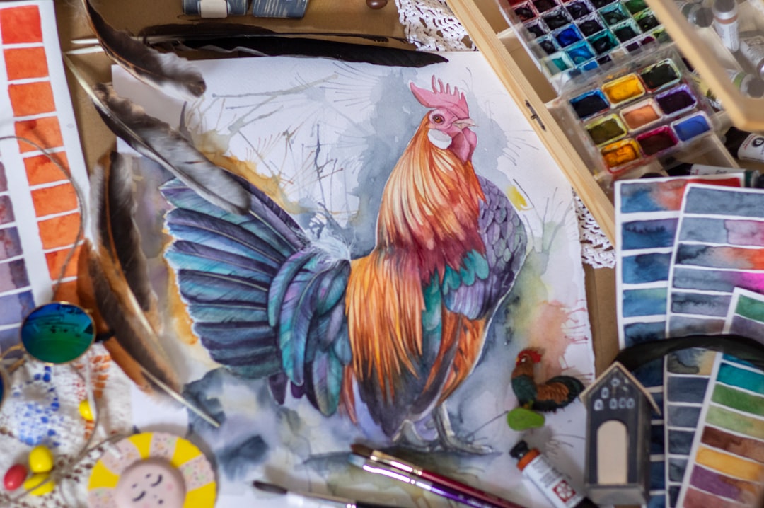 yellow red and blue rooster painting
