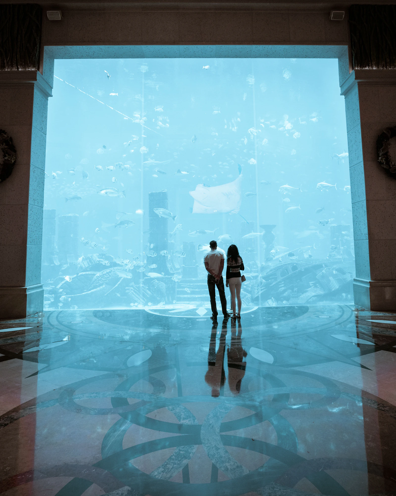 Visitors in front of the Dubai Mall aquarium