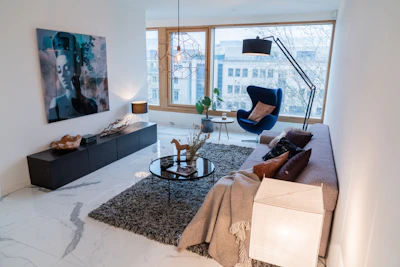 black and brown round table near brown sofa