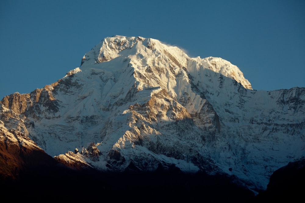 white and gray mountain under blue sky during daytime