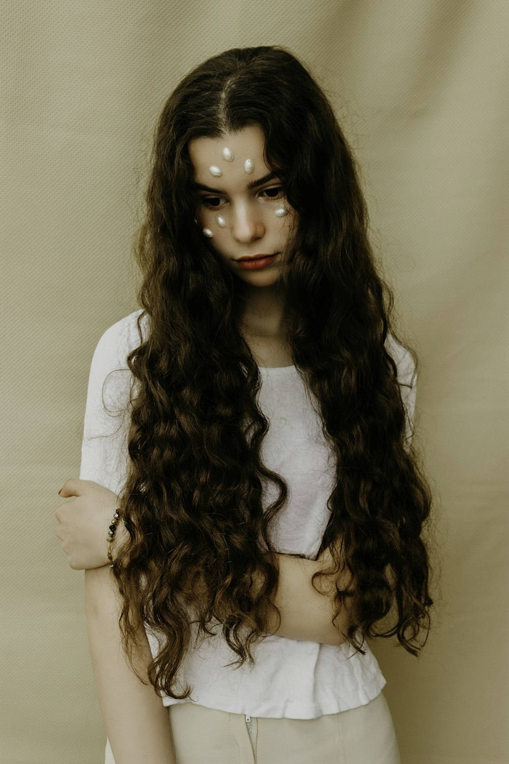 woman in white long sleeve shirt