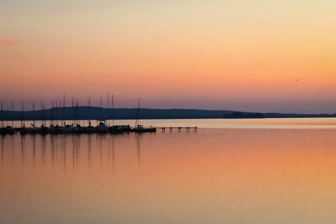 body of water during sunset