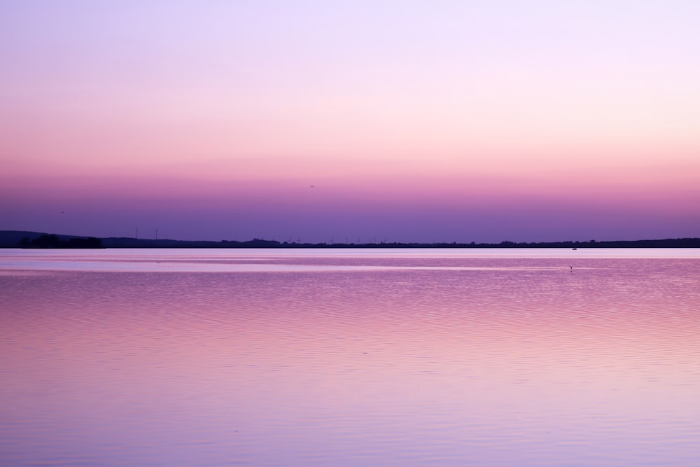 calm sea under blue sky