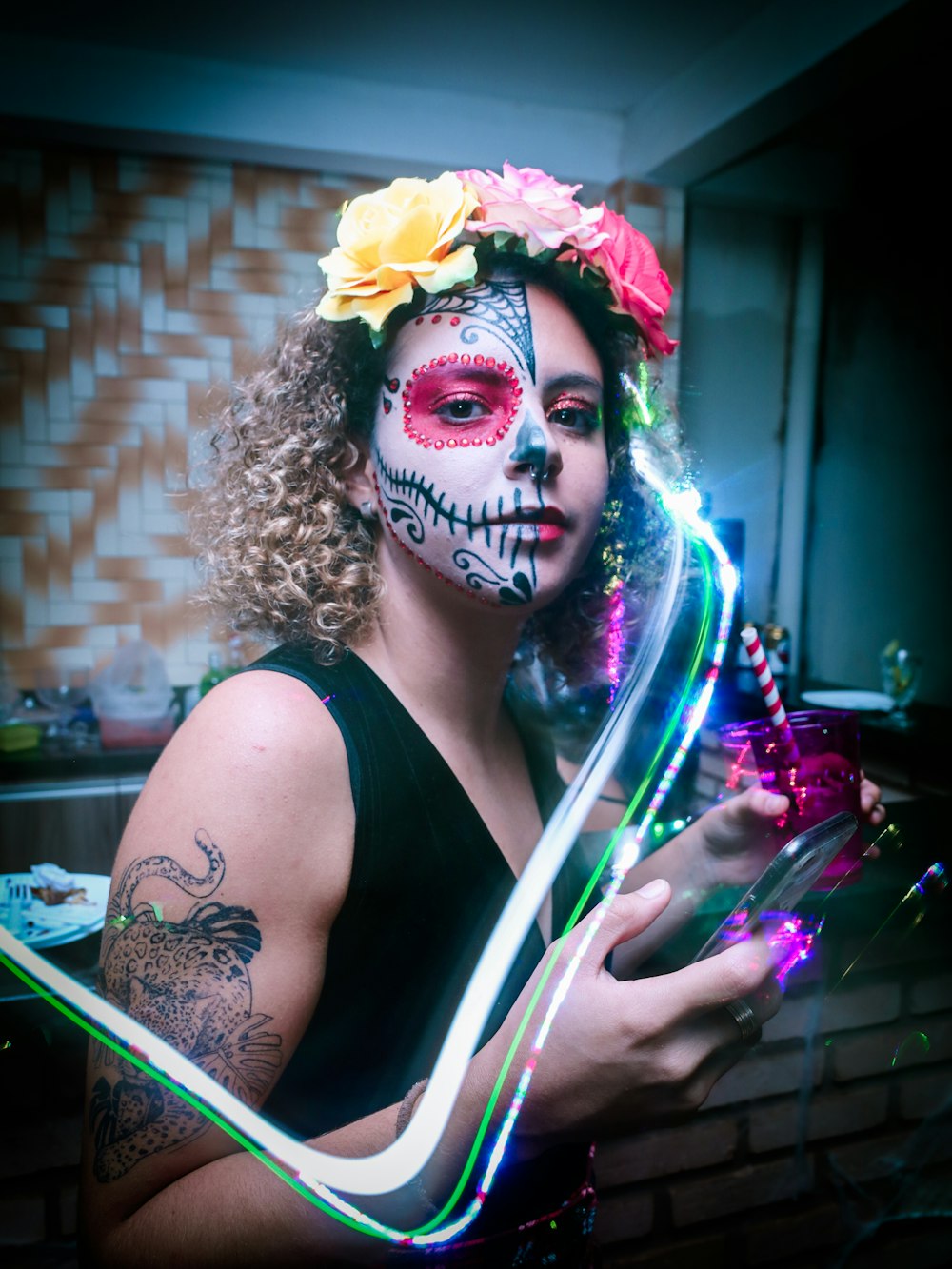 woman in black tank top with white mask