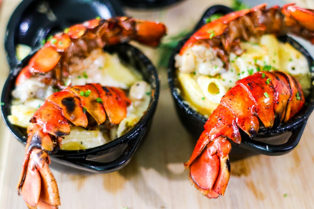 cooked shrimp on black ceramic bowl