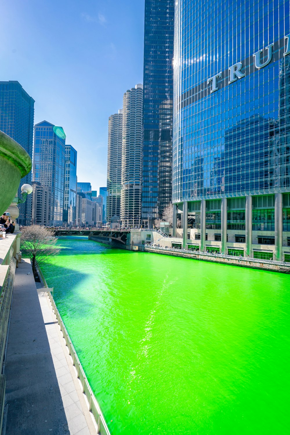 body of water near high rise buildings during daytime