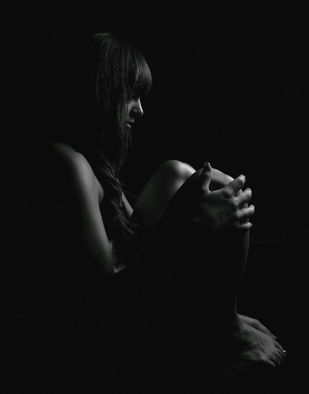 grayscale photo of woman in black tank top