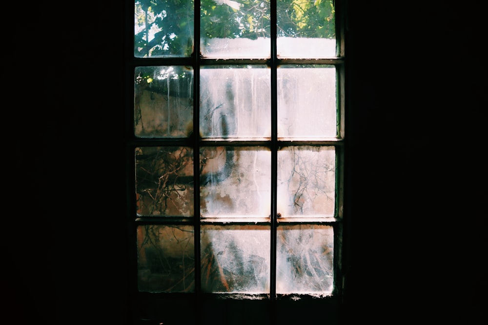 black wooden framed glass window