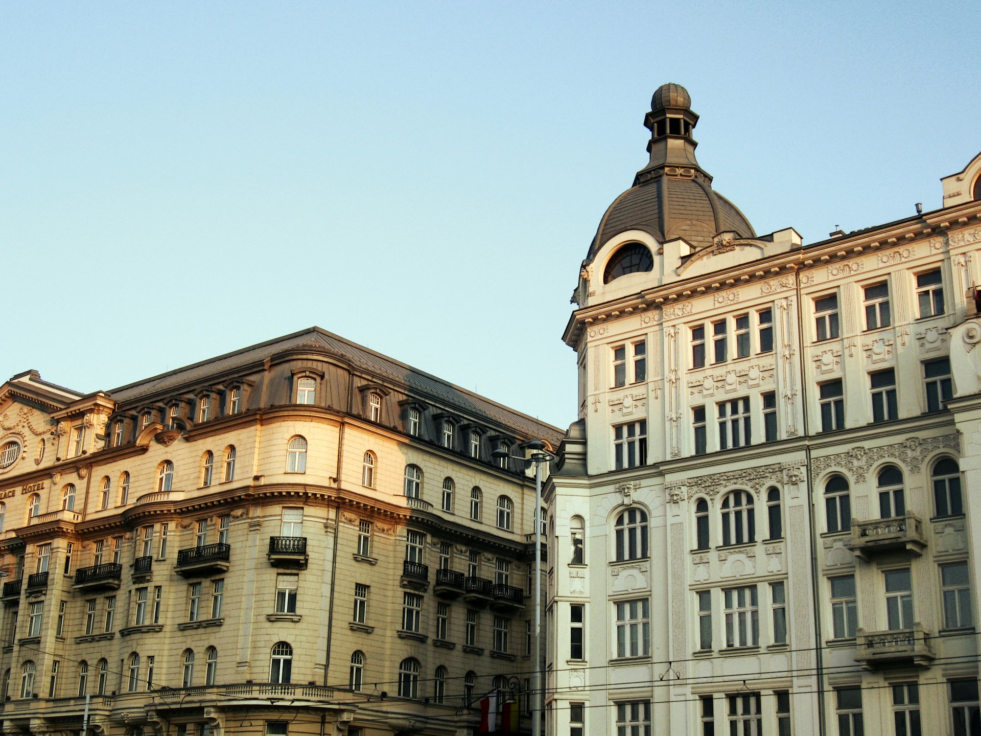 brown concrete building under blue sky during daytime