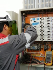 man in gray and red jacket