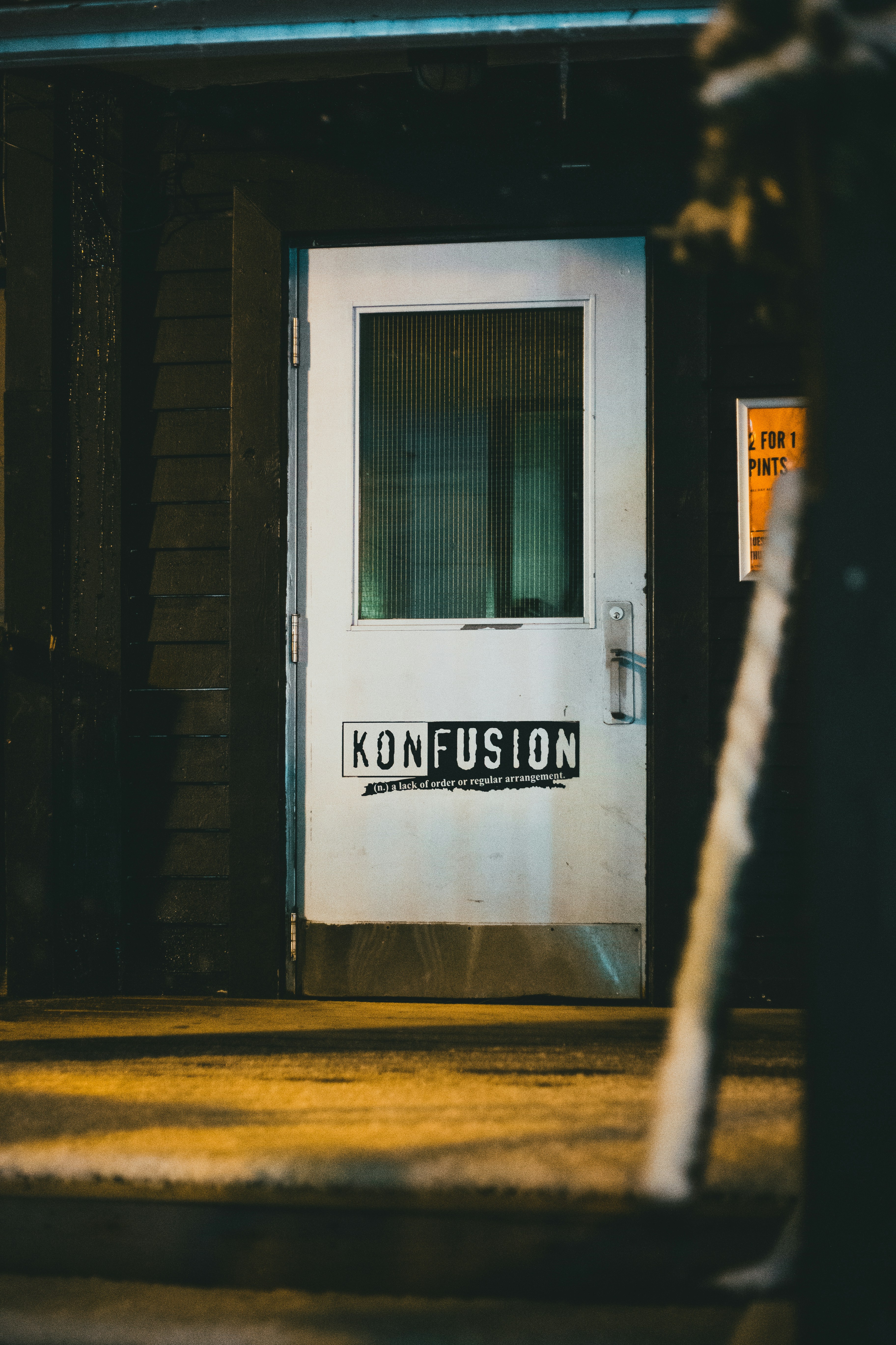 white wooden door with glass
