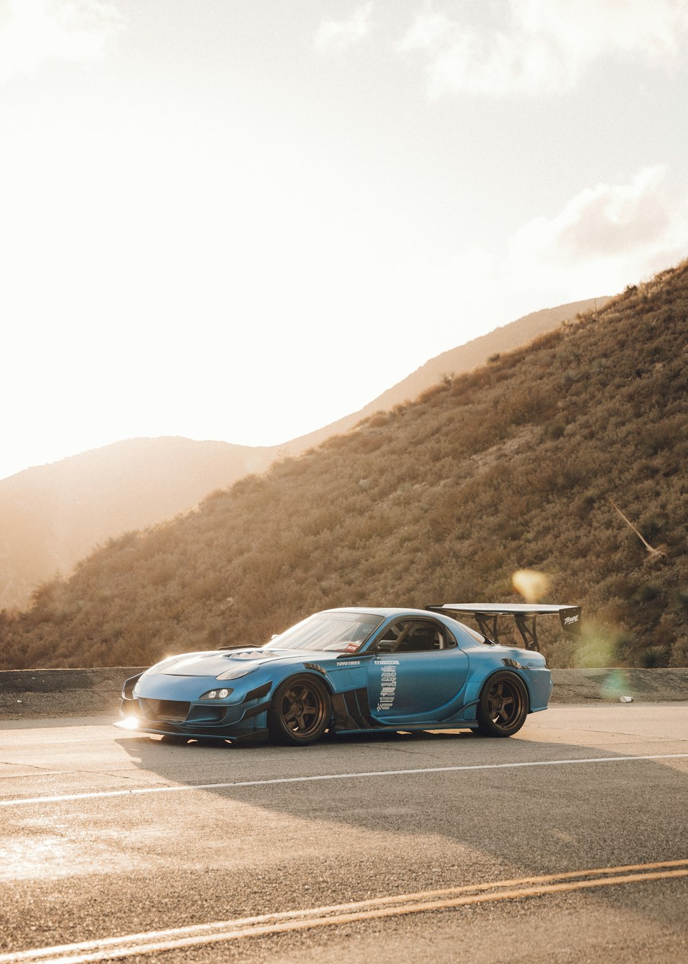 blue bmw m 3 coupe on road during daytime