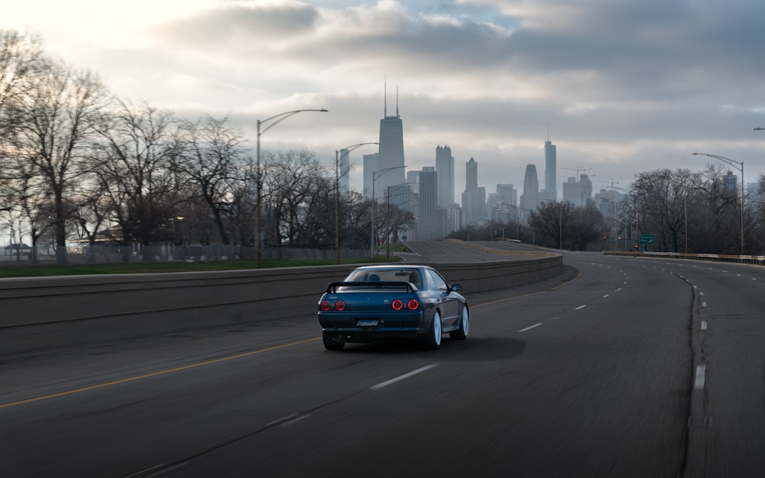 black car on road during daytime