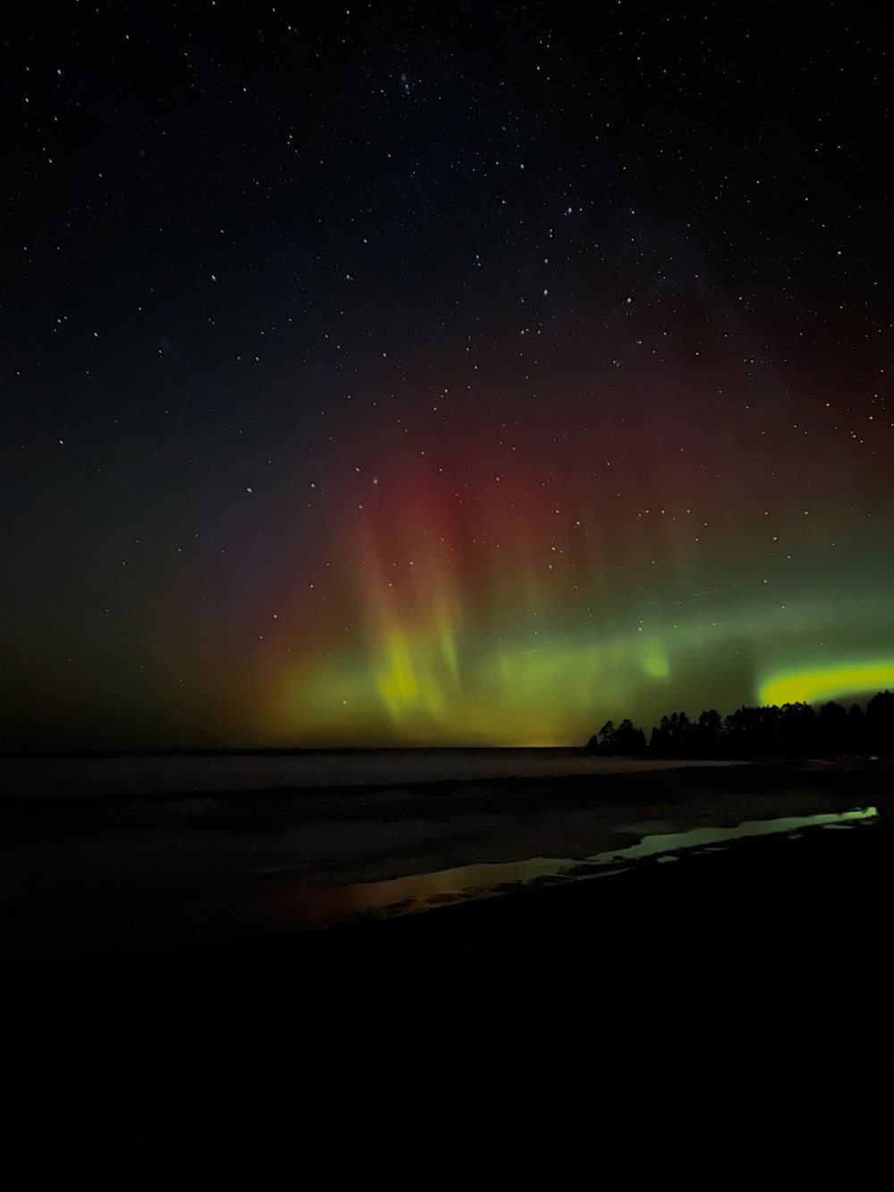 green and blue light in the sky