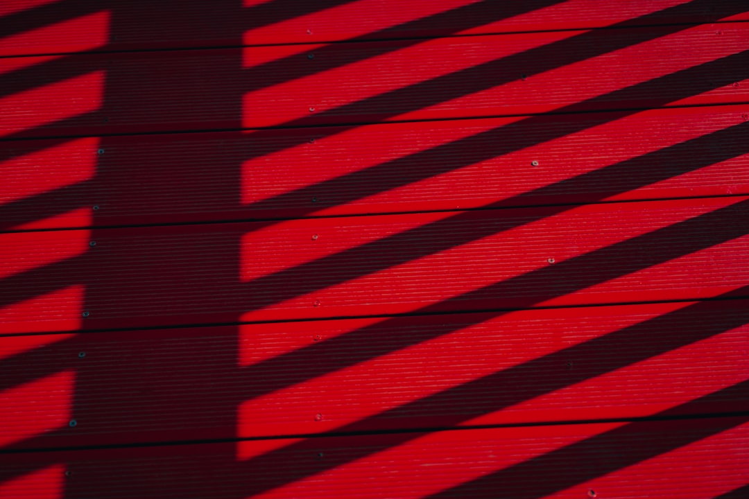 red and black striped textile