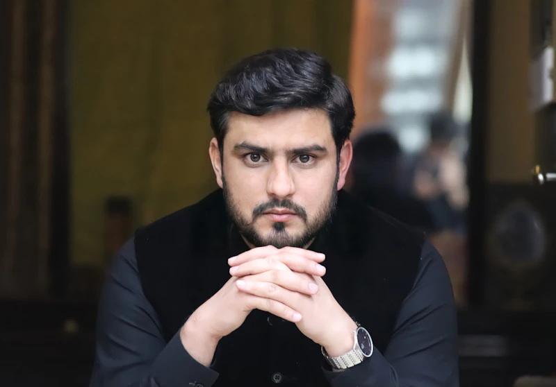 Stylish sugar baby in a black long sleeve shirt