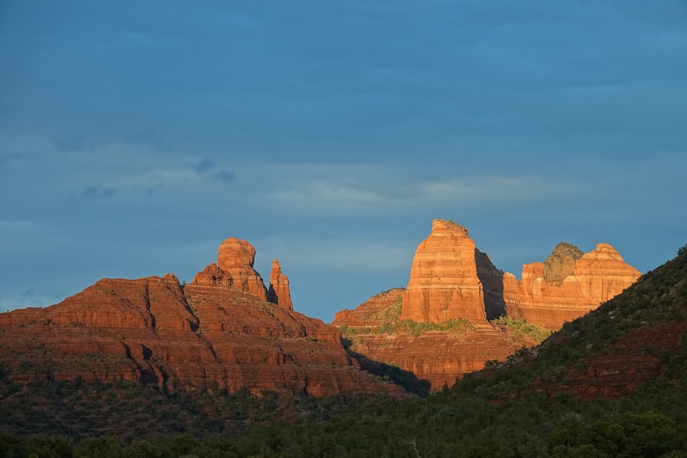 brown rock formation under blue sky during daytime