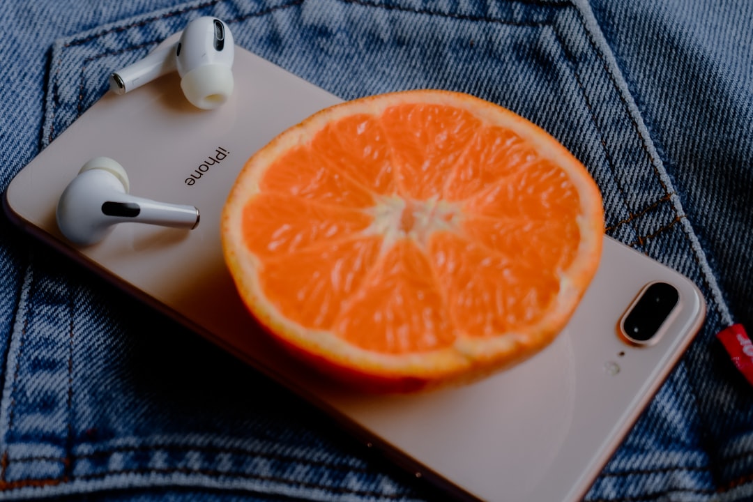 sliced orange fruit on white ceramic plate