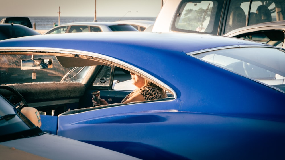 blue car with brown and white leopard print