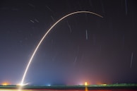 A glowing rocket launching into a starry sky, symbolizing bold results and breakthrough ideas.