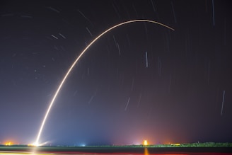 A glowing rocket launching into a starry sky, symbolizing bold results and breakthrough ideas.
