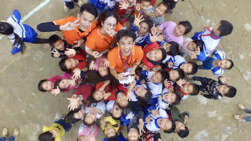 children in red and white shirts