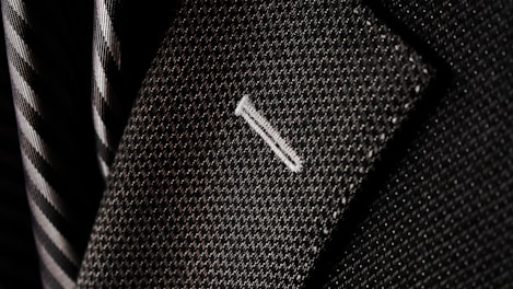 A close-up of a well-fitted suit jacket.
