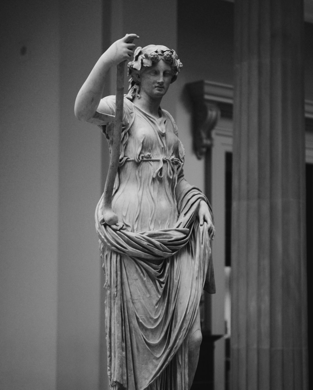 woman statue in grayscale photography
