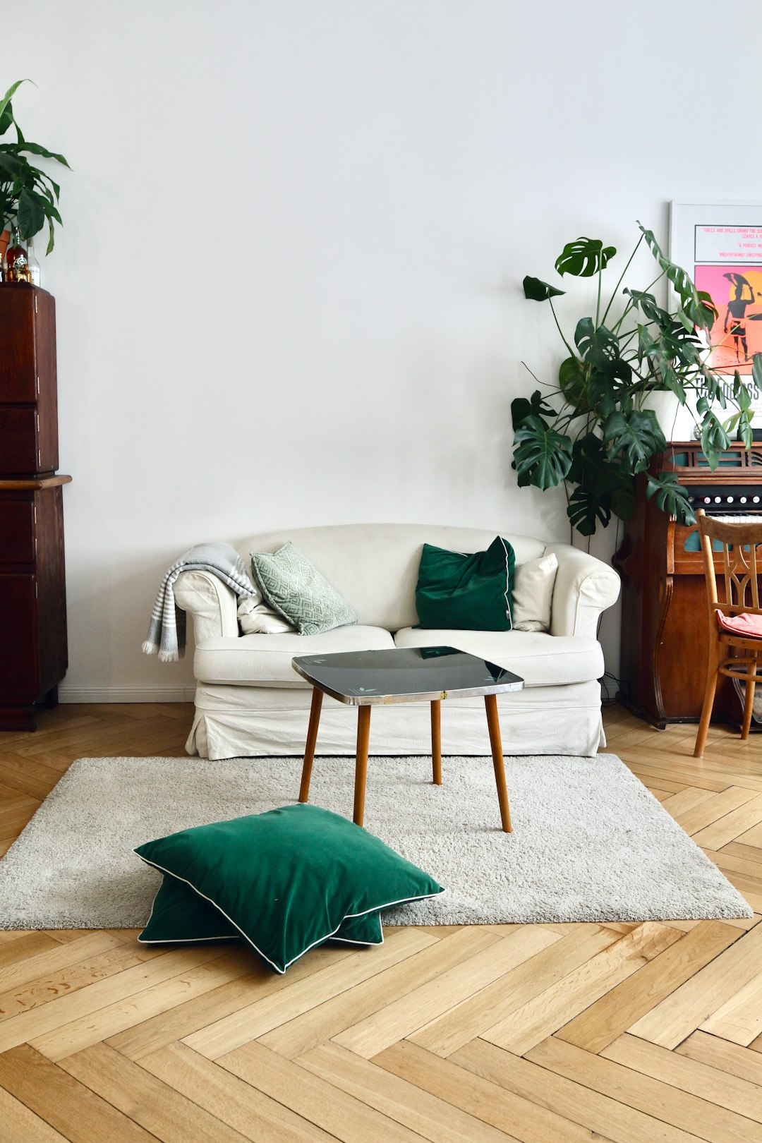  green throw pillow on white sofa sofa