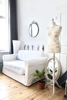 white sofa with throw pillows
