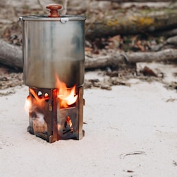 stainless steel kettle on fire